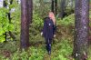 Blæst Bergen Poncho i svart med hette og frontlomme, designet for komfort og beskyttelse mot regn og vind.
