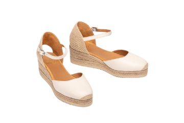 Unisa CISCA_26_NTO espadrillos til dame i ivory skinn med flettet kilehæl og justerbar ankelrem.
