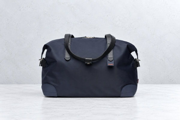 Mørk blå SWIMS 24H Holdall weekendbag i nylon med skinnhåndtak til dame og herre